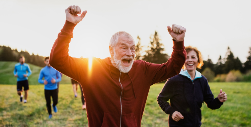 People participating in an outdoor fitness activity, highlighting the importance of physical health, vitality and active living as part of long-term financial well-being.